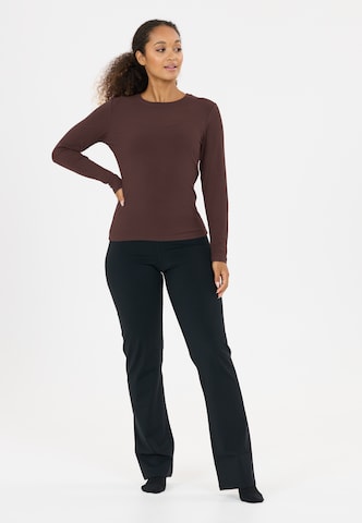 Athlecia Performance shirt 'Tinashe V2' in Brown