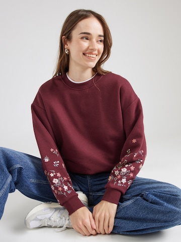 ABOUT YOU Sweatshirt 'Gitta' in Red: front