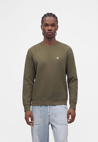Calvin Klein JeansSweater majica - zelena boja: prednji dio