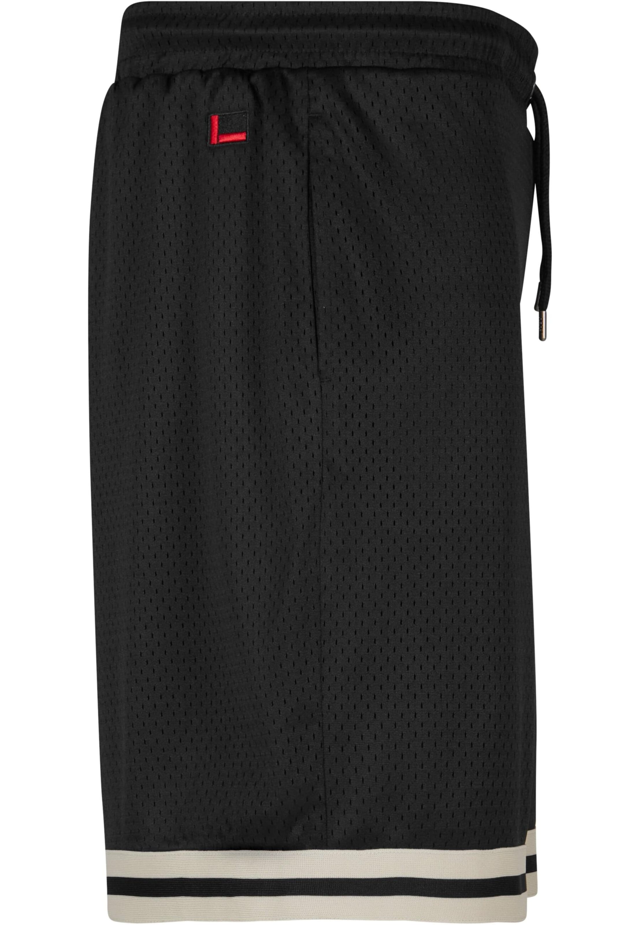 FUBU Normalny krój Spodnie 'Varsity' w kolorze czarny