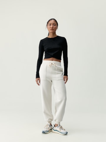 Born Regular Sports trousers ' Bloom ' in Beige