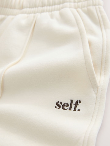 smėlio self. Plačios klešnės Kelnės