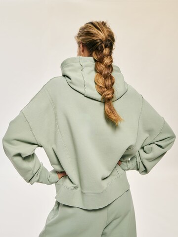 Kamila Šikl Sweatjacke (OCS) in Grün