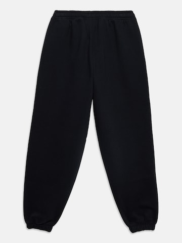 Nike Sportswear Tapered Παντελόνι 'STUDIO' σε μαύρο