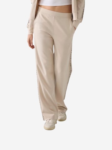 GUESS - Pierna ancha Pantalón deportivo 'GUESSXNS SWEAT PANTS W6GB29 K3282' en beige