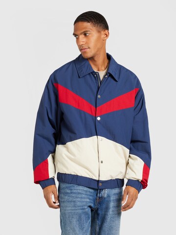 Veste mi-saison 'GAME DAY' Tommy Jeans en bleu : devant