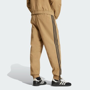 ADIDAS ORIGINALS Конический (Tapered) Штаны 'Adicolor Firebird' в Коричневый