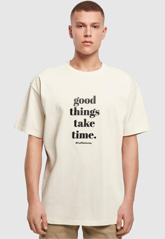 T-Shirt 'Good Things Take Time' Merchcode en beige : devant