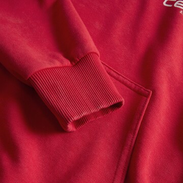 PUMA Sportsweatshirt 'Scuderia Ferrari Desert Sun Replica Team' in Rot