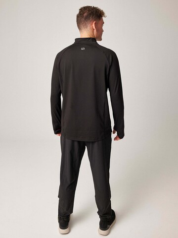 SNOCKS Sportsweatshirt in Zwart