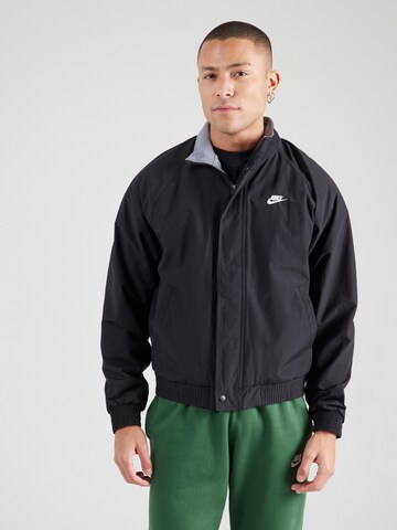 Nike Sportswear Övergångsjacka 'FUTURA' i svart: framsida