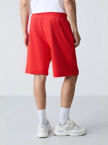Tommy Life - Regular Calças de desporto em vermelho