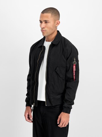 ALPHA INDUSTRIES Välikausitakki 'CWU-36/P' värissä musta