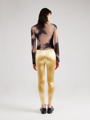 Skinny Leggings di The Kooples in oro