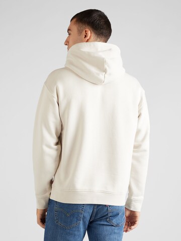 LEVI'S ® Collegepaita 'Relaxed Baby Tab Hoodie' värissä valkoinen