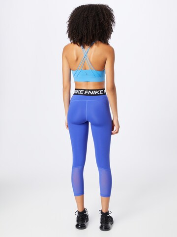 NIKE Skinny Sportbroek in Blauw