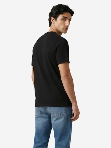 Maglietta 'DM0DM22538' di Tommy Jeans in nero