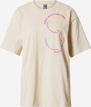 ADIDAS BY STELLA MCCARTNEY - Camiseta funcional en beige: frente