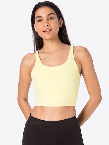 NIKE Regular Sports Bra in Yellow: front