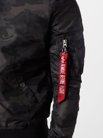 ALPHA INDUSTRIES Between-Season Jacket in Black