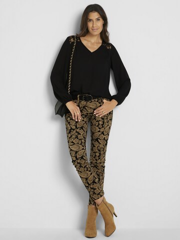 Slimfit Pantaloni de la bonprix pe negru