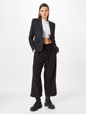 s.Oliver BLACK LABEL - Pierna ancha Pantalón en negro