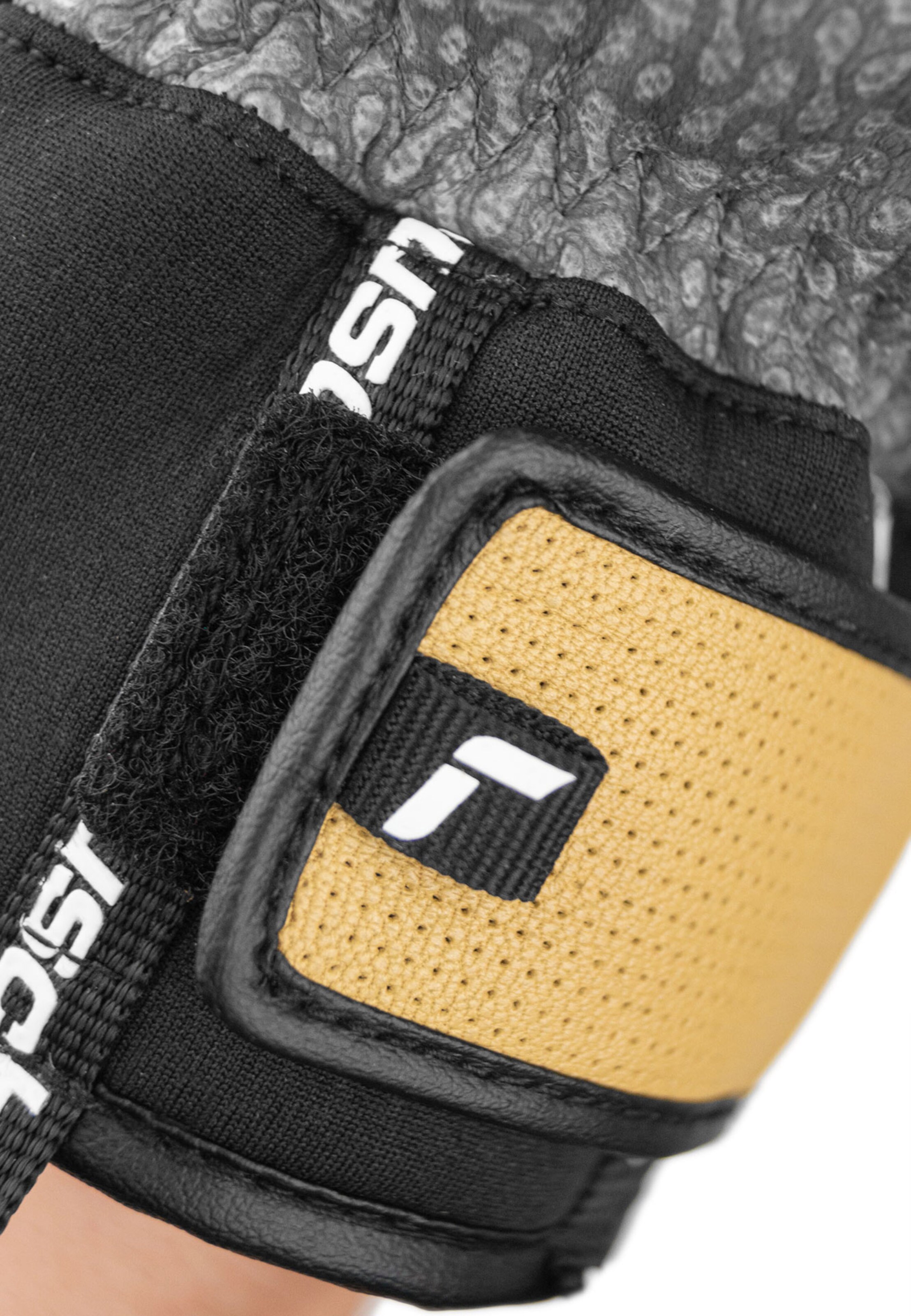 REUSCH Sporthandschoenen 'Henrik Kristoffersen' in Bruin