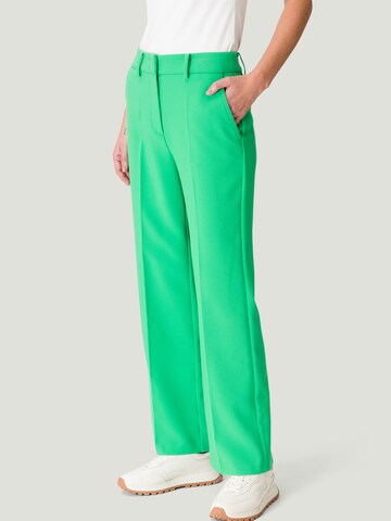 zero Slim fit Pleated Pants in Green: front