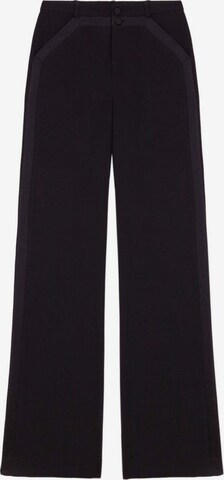 Scalpers Flared Pants in Black: front