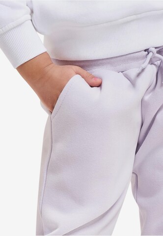 Tapered Pantaloni de la Urban Classics pe mov