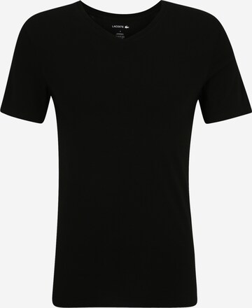 Tricou de la LACOSTE pe negru: față