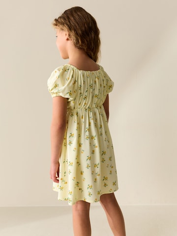 Next Mekko värissä keltainen