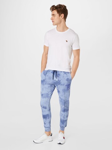 Tapered Pantaloni di Tommy Jeans in blu
