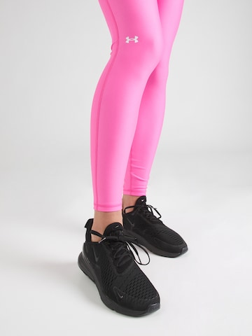 Skinny Pantaloni sport 'Evolved' de la UNDER ARMOUR pe roz