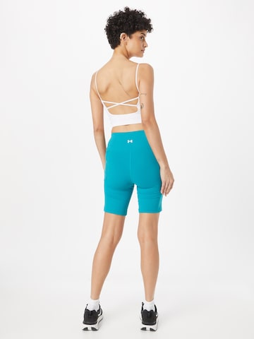 UNDER ARMOUR Slimfit Sportovní kalhoty 'Meridian' – zelená