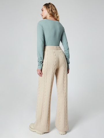 florence by mills exclusive for ABOUT YOU Wide leg Trousers 'Rosa' in Beige