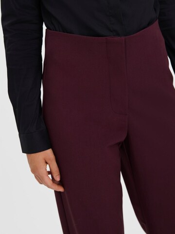 Regular Pantalon à plis VERO MODA en rouge