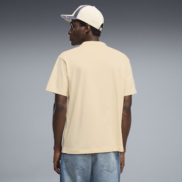 PUMA T-Shirt 'Essentials Elevated No.1' in Gelb