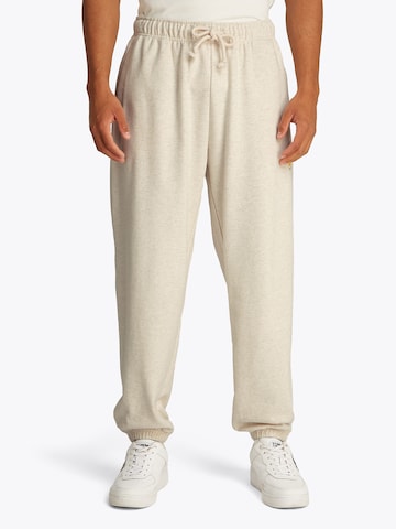 Tommy Jeans - Tapered Calças 'VARSITY' em bege: frente