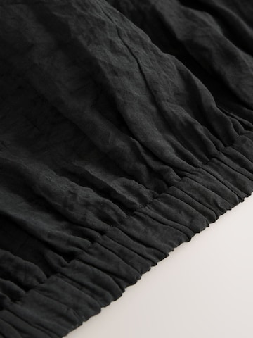 Next Top in Black