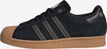 Baskets basses 'Superstar' ADIDAS ORIGINALS en noir : devant