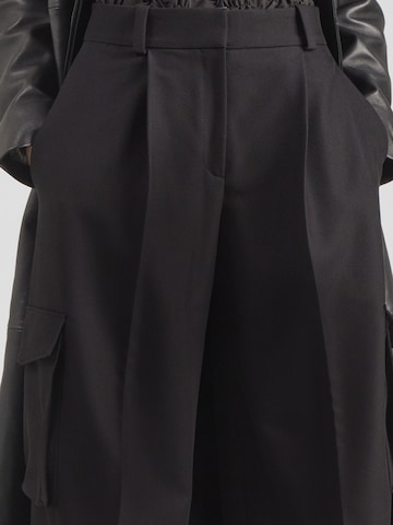 Wide leg Pantaloni con piega frontale 'Hubike' di HUGO in nero