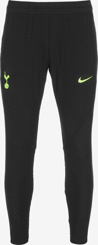 NIKE Skinny Workout Pants in Black: front