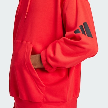 Sweat de sport 'Essentials' ADIDAS SPORTSWEAR en rouge