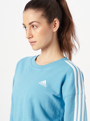 ADIDAS SPORTSWEAR Αθλητική μπλούζα φούτερ 'Essentials' σε μπλε