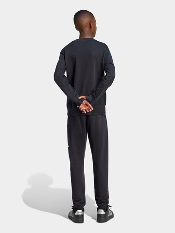 ADIDAS SPORTSWEAR Treenipuku värissä musta