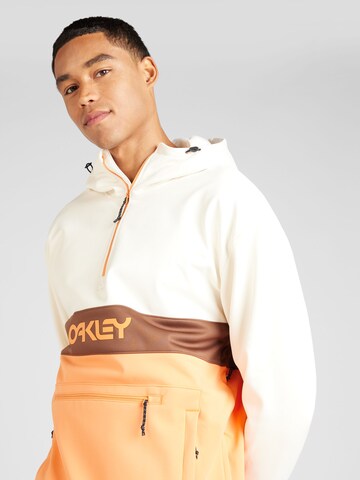 OAKLEY Αθλητική μπλούζα φούτερ 'NOSE GRAB' σε πορτοκαλί