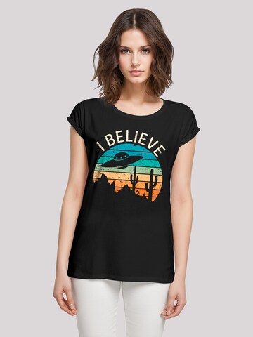 T-shirt 'I Believe UFO Alien Sonnenuntergang' F4NT4STIC en noir : devant