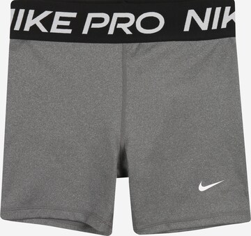 NIKE Skinny Sportbroek in Grijs: voorkant