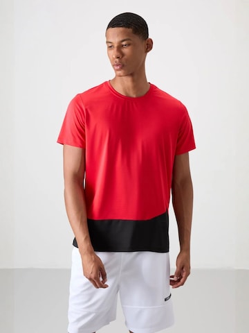 T-Shirt fonctionnel Tommy Life en rouge